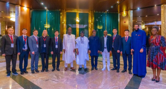 President Bola Tinubu (Middle) Government officials and Avatar Chinese firm personnel